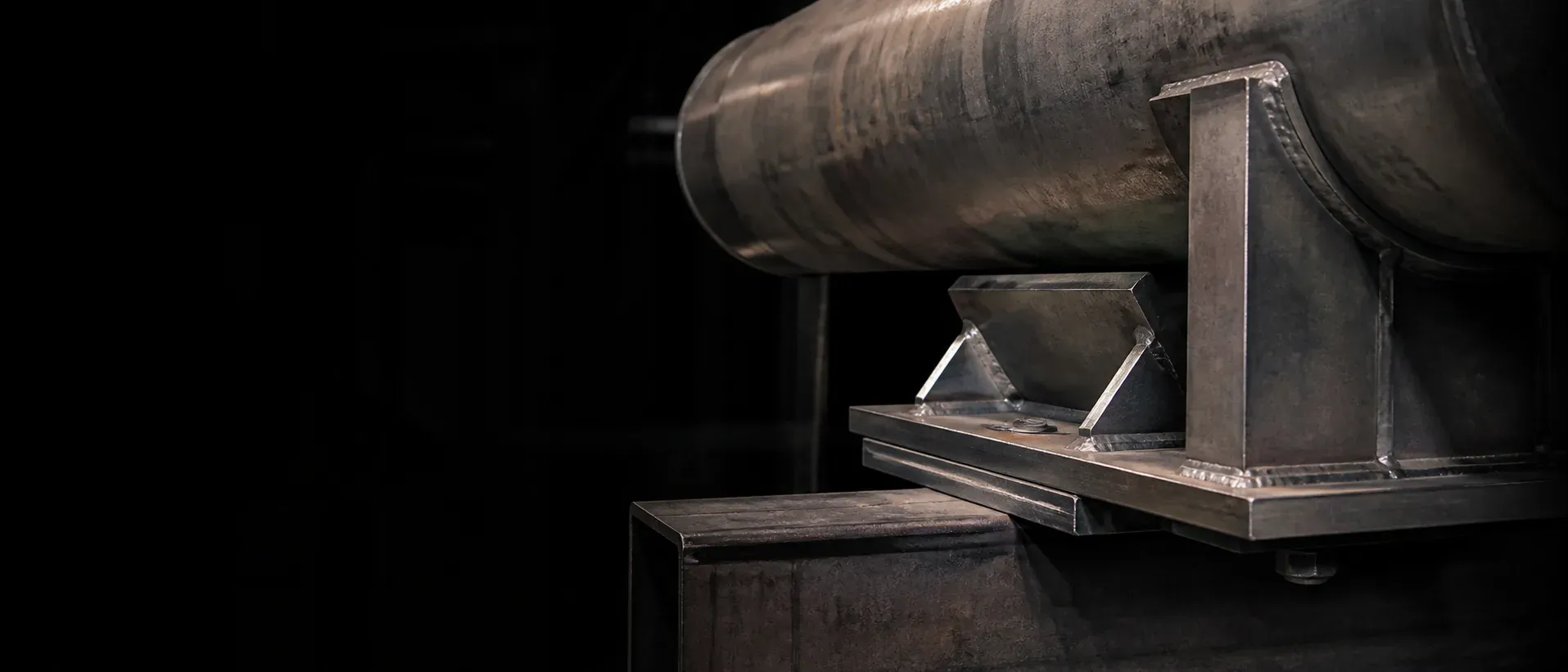 PE-sealed welded pipe supports installed in an industrial piping system